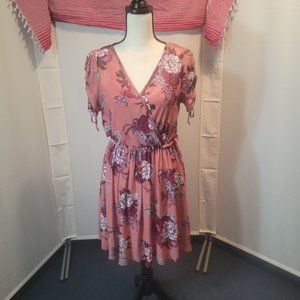 Blue Rain coral, short sleeved fit and flair dress with dark floral design.